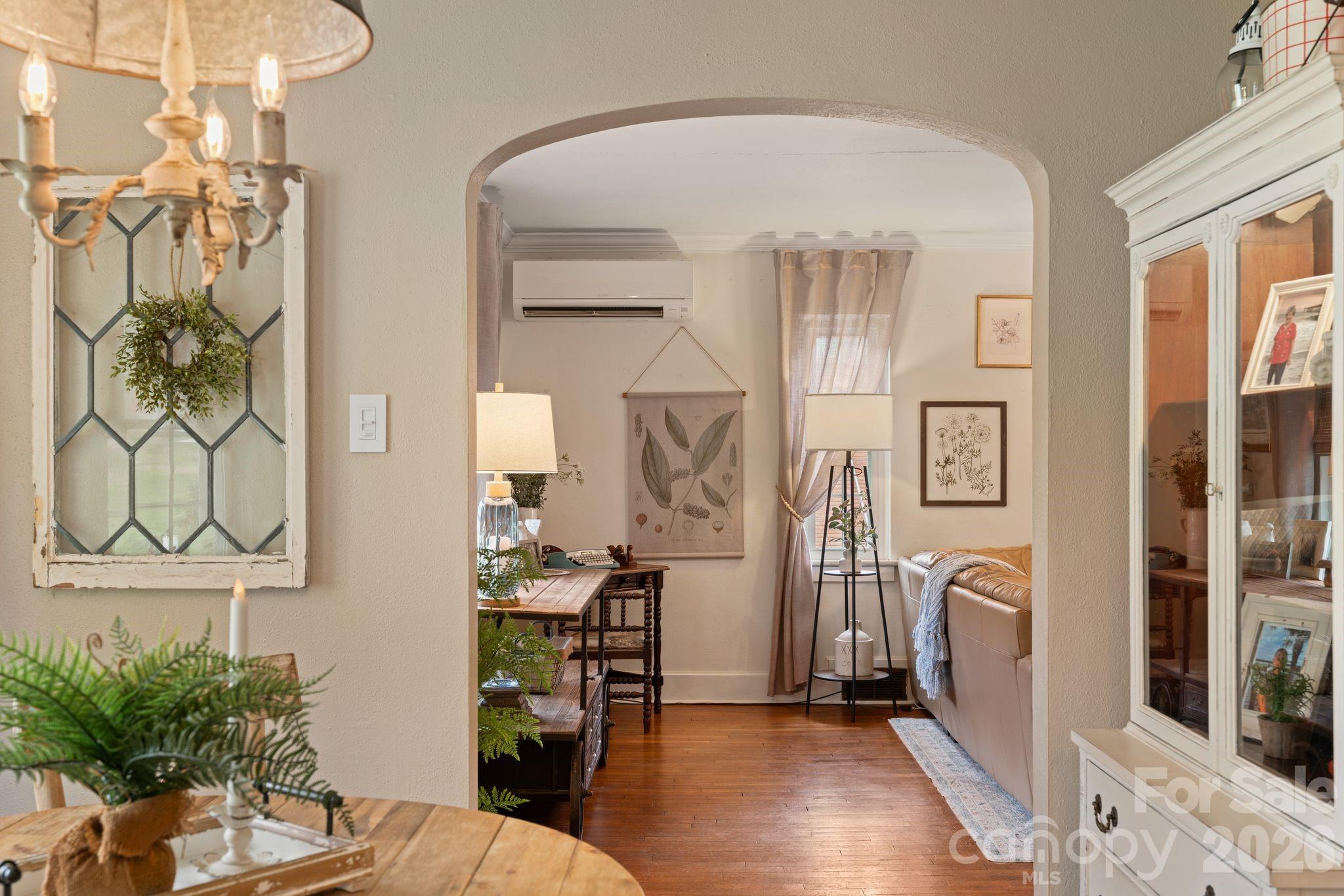 121 Johnson Street Canton, NC 28716 - Photo 11 of 32 a living room with furniture a flat screen tv and a table