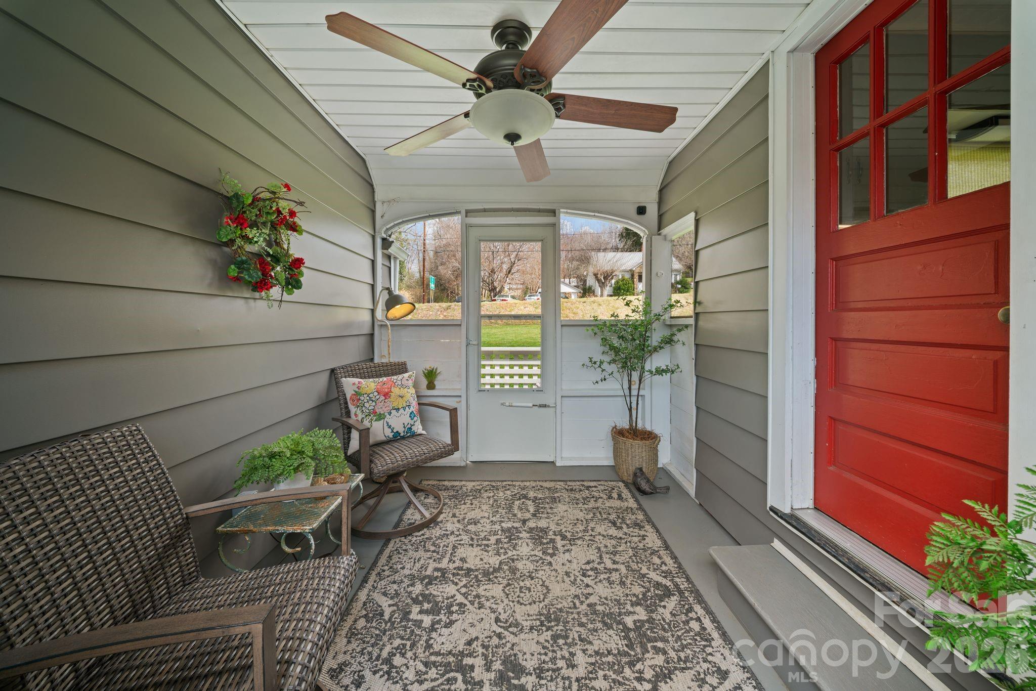 121 Johnson Street Canton, NC 28716 - Photo 19 of 32 a bench sitting in front of a door