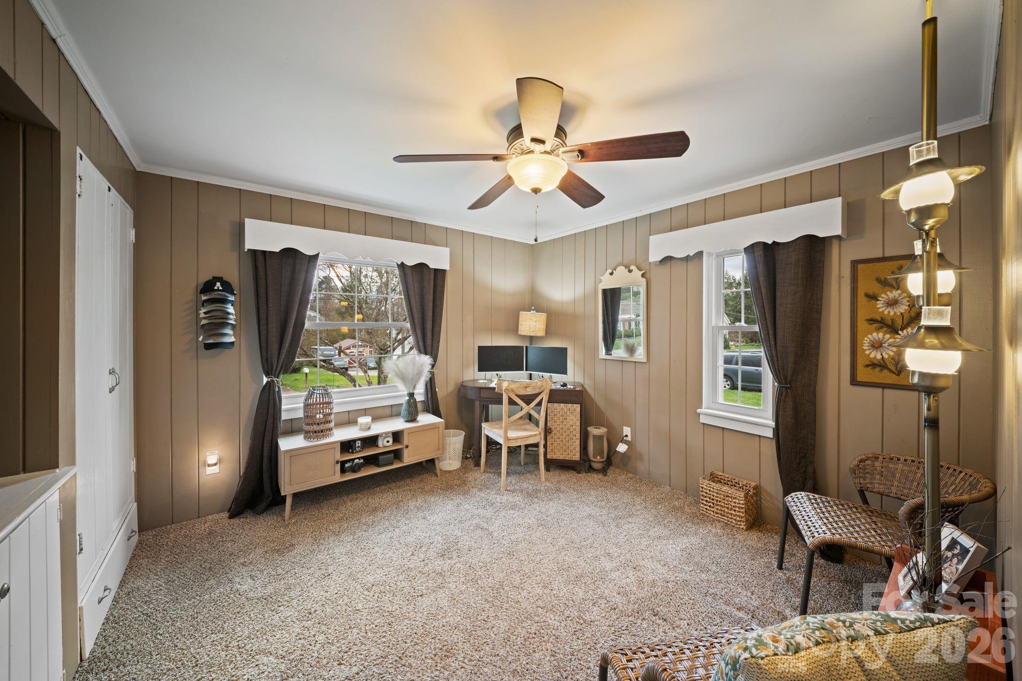121 Johnson Street Canton, NC 28716 - Photo 20 of 32 a living room with furniture and a window