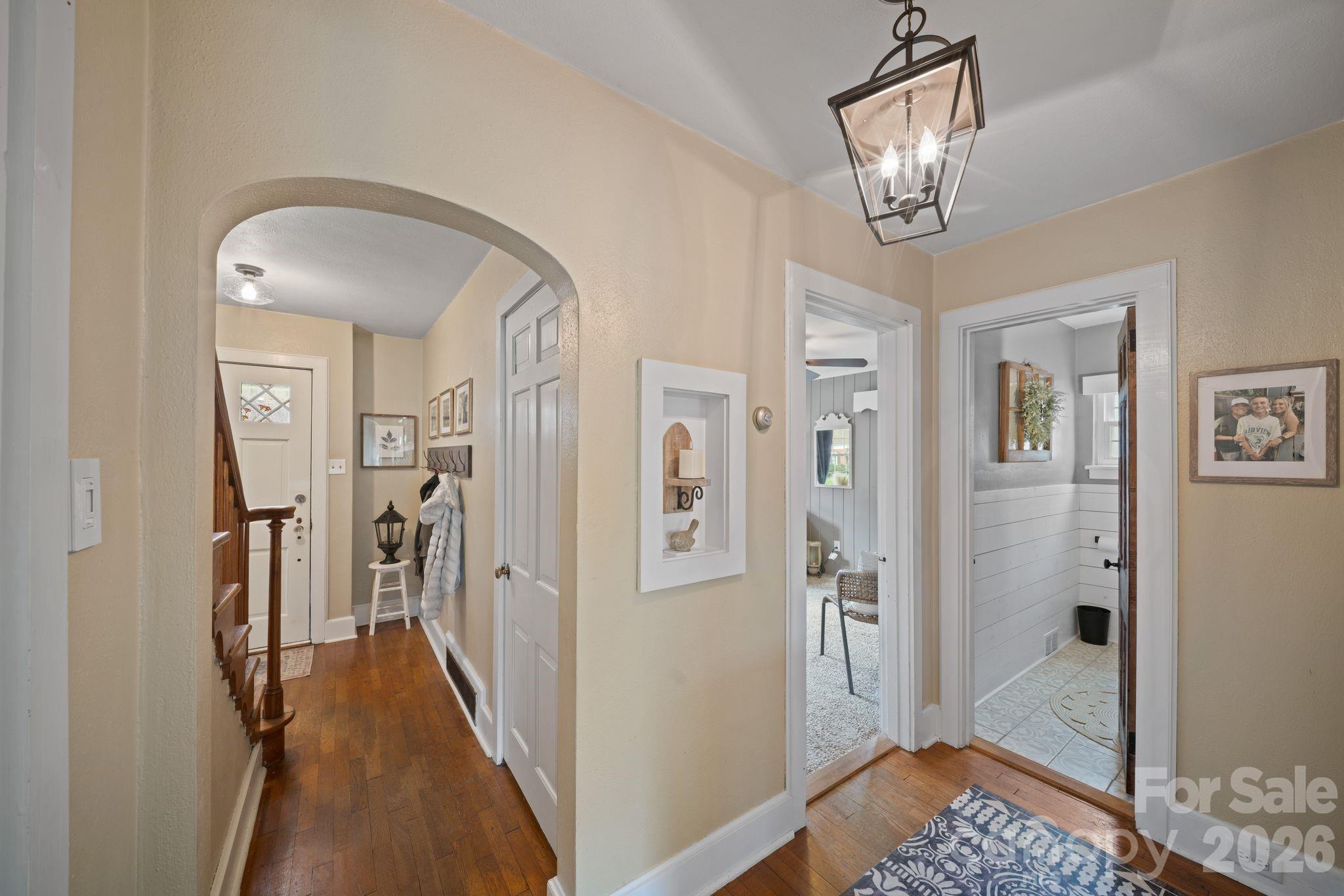121 Johnson Street Canton, NC 28716 - Photo 22 of 32 a view of a livingroom from a hallway