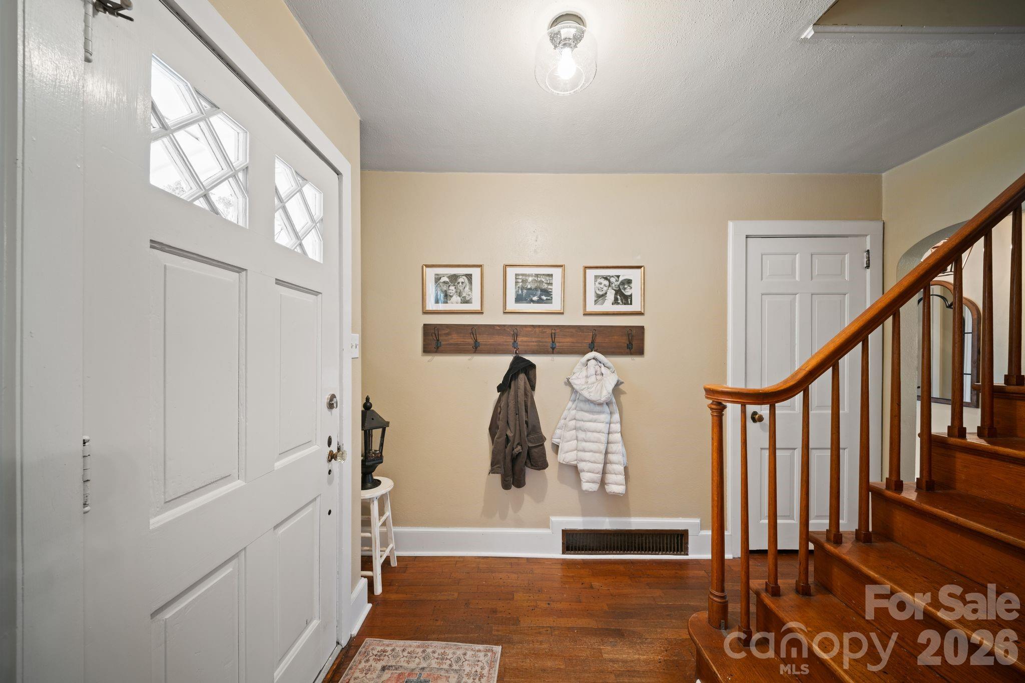121 Johnson Street Canton, NC 28716 - Photo 6 of 32 a view of an entryway with wooden floor
