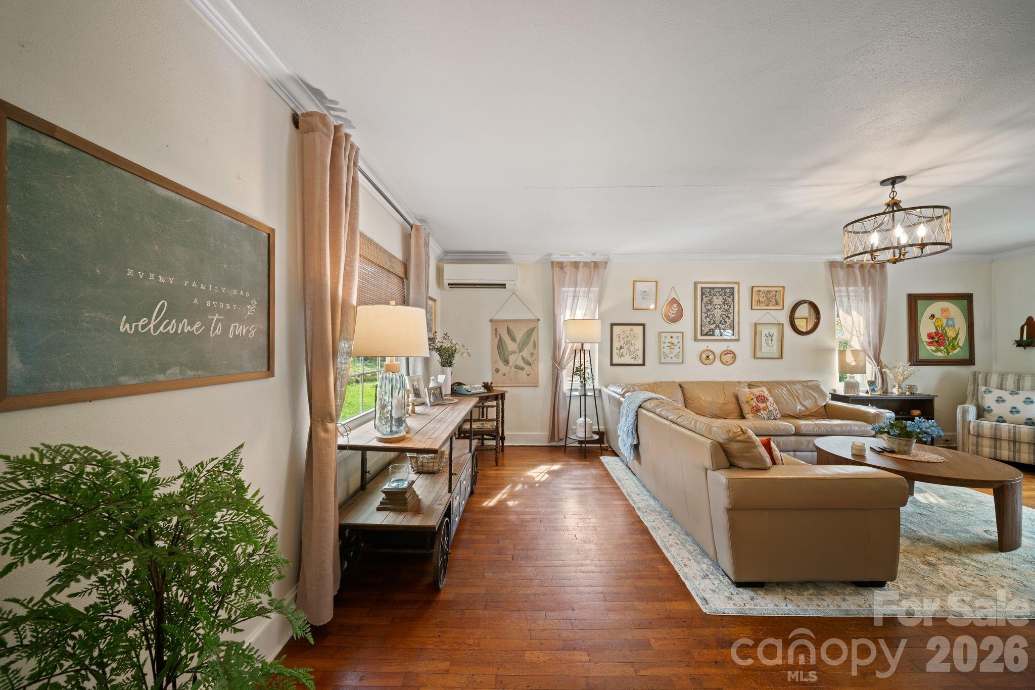 121 Johnson Street Canton, NC 28716 - Photo 10 of 32 a living room with furniture and a large window