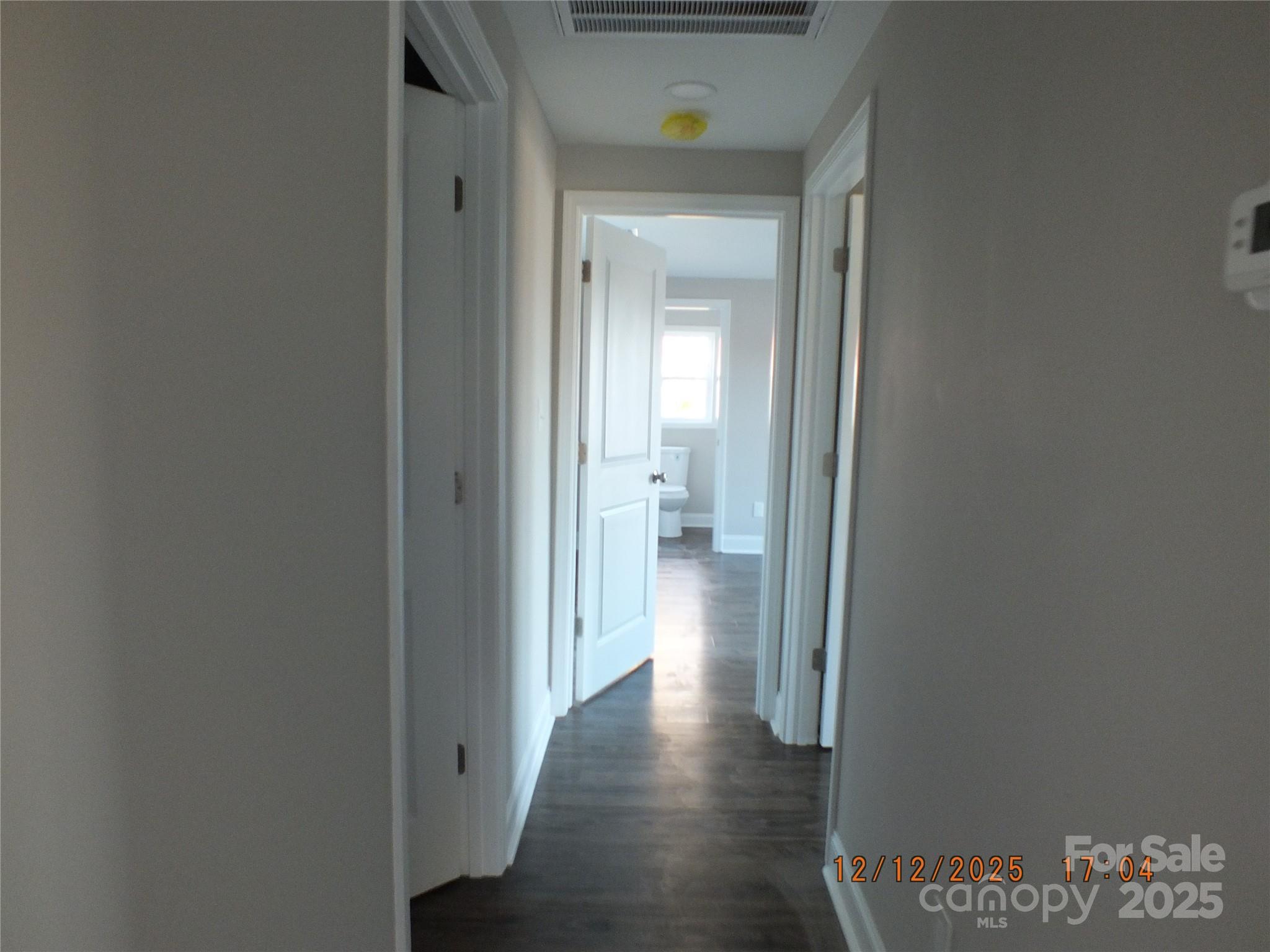1740 Rocky River Road Lancaster, SC 29720 - Photo 20 of 31 a view of a hallway with wooden floor