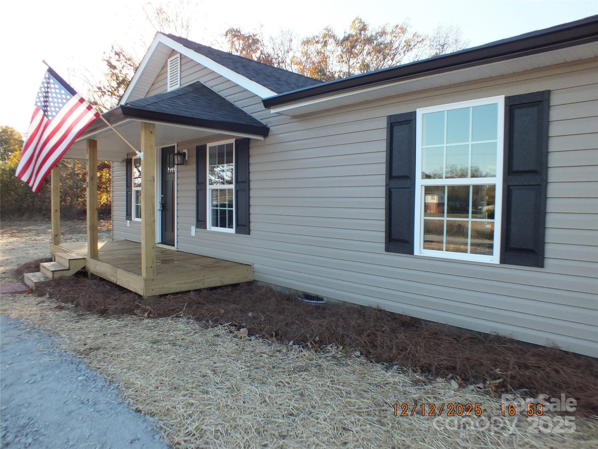 1740 Rocky River Road Lancaster, SC 29720 - Photo 2 of 31 a view of a house with a yard