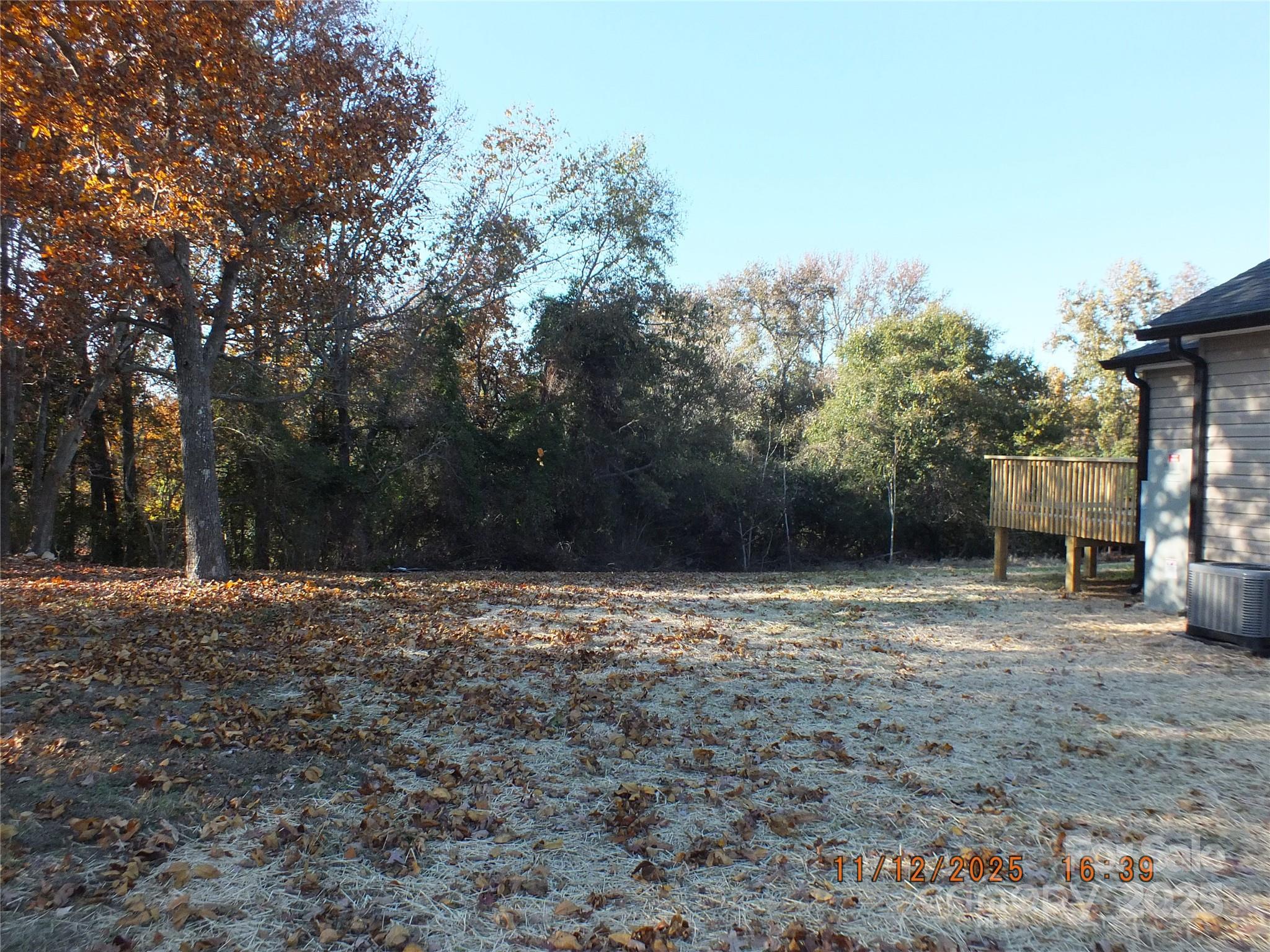 1740 Rocky River Road Lancaster, SC 29720 - Photo 27 of 31 a backyard of a house with lots of green space