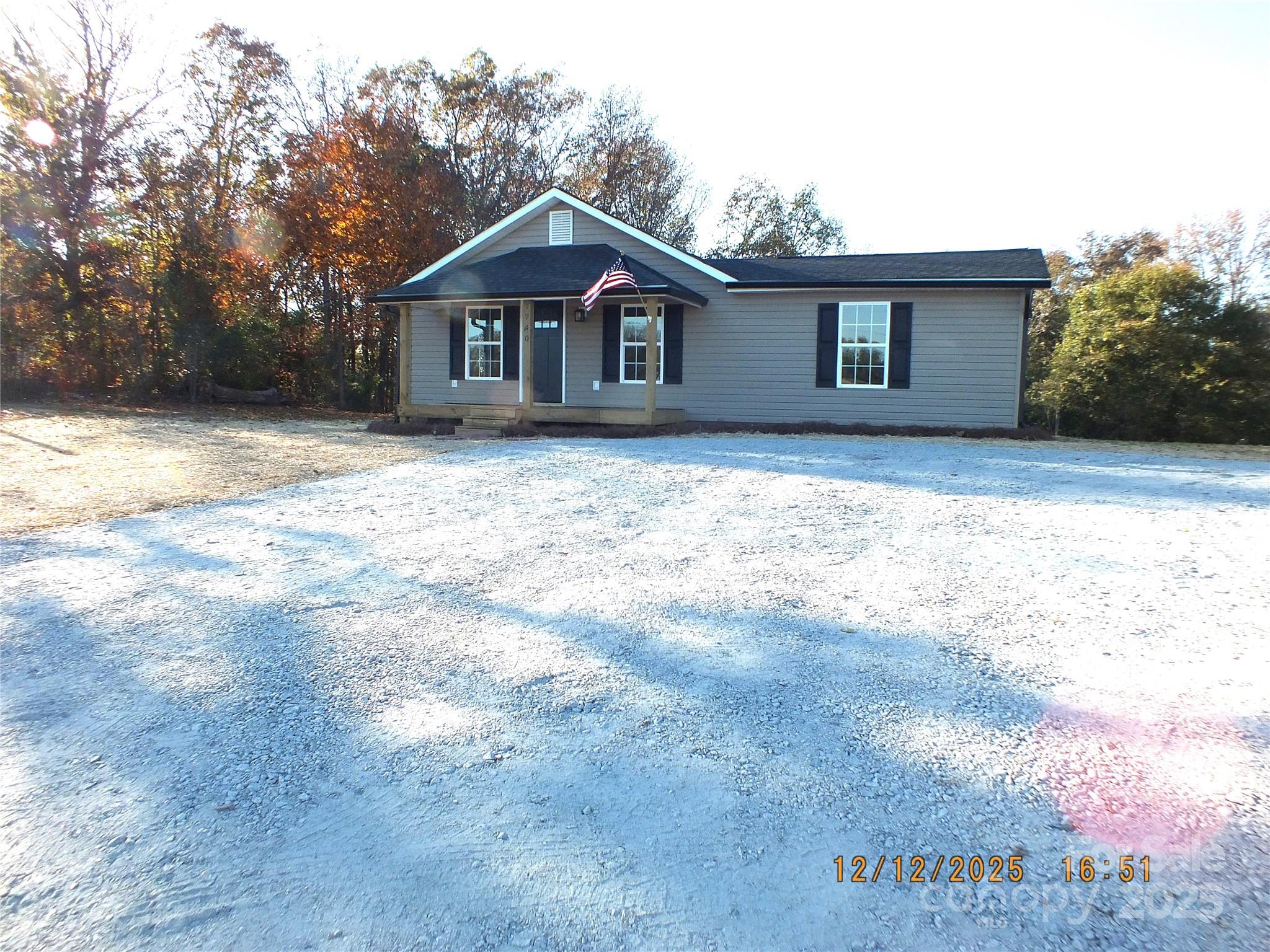1740 Rocky River Road Lancaster, SC 29720 - Photo 31 of 31 a front view of a house with a yard