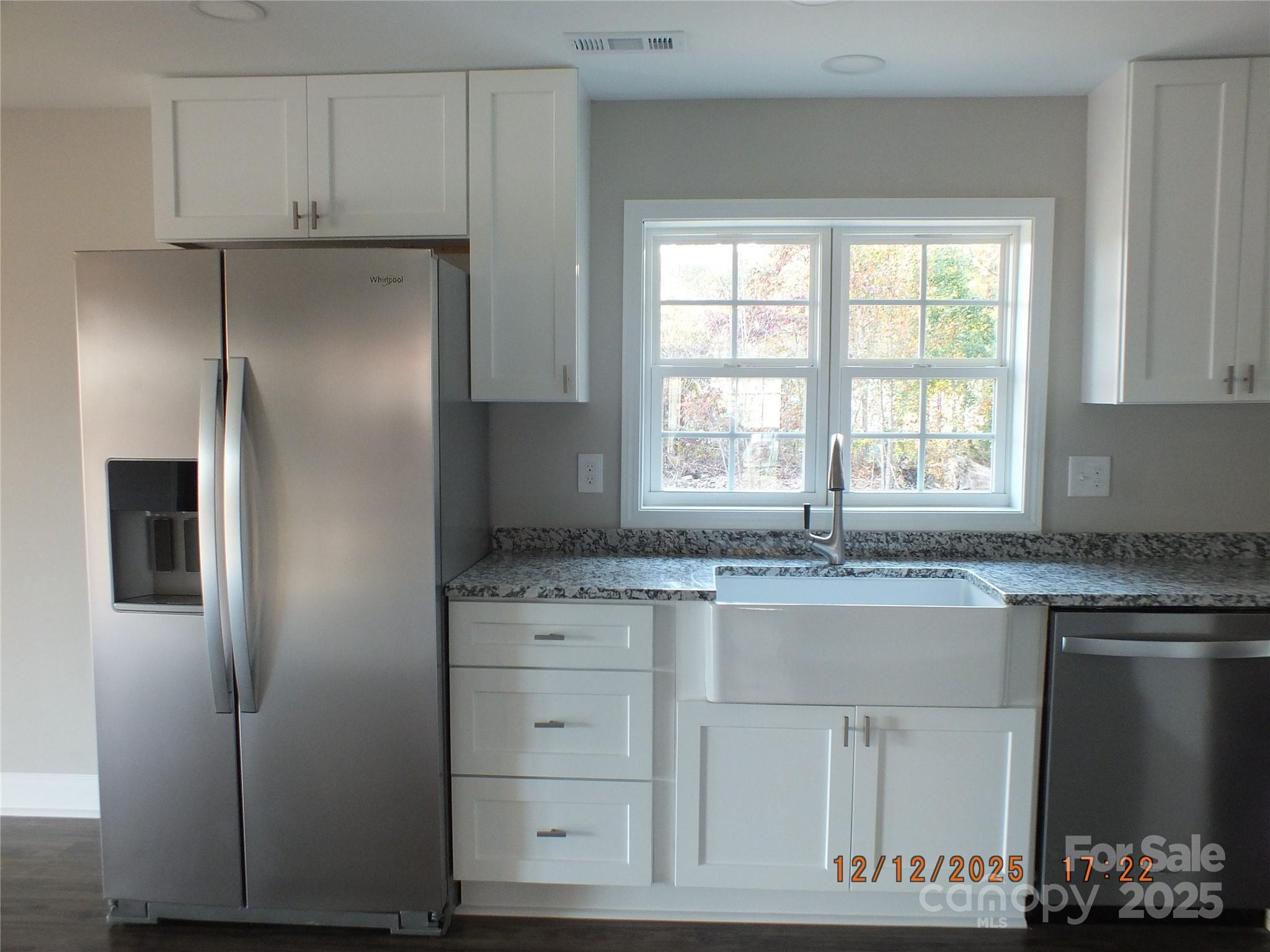 1740 Rocky River Road Lancaster, SC 29720 - Photo 8 of 31 a kitchen with granite countertop a refrigerator and a sink