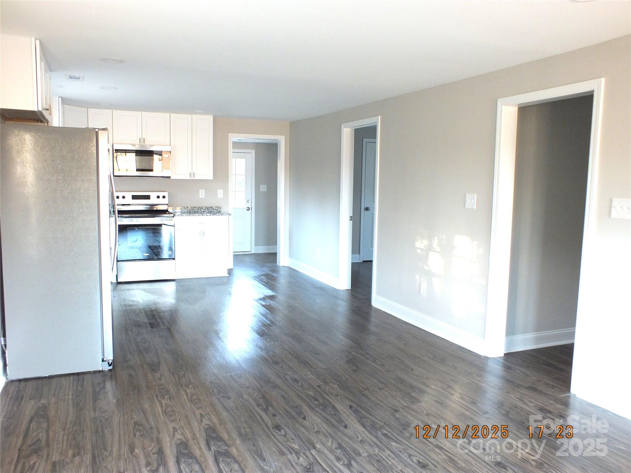 1740 Rocky River Road Lancaster, SC 29720 - Photo 9 of 31 a view of kitchen with wooden floor