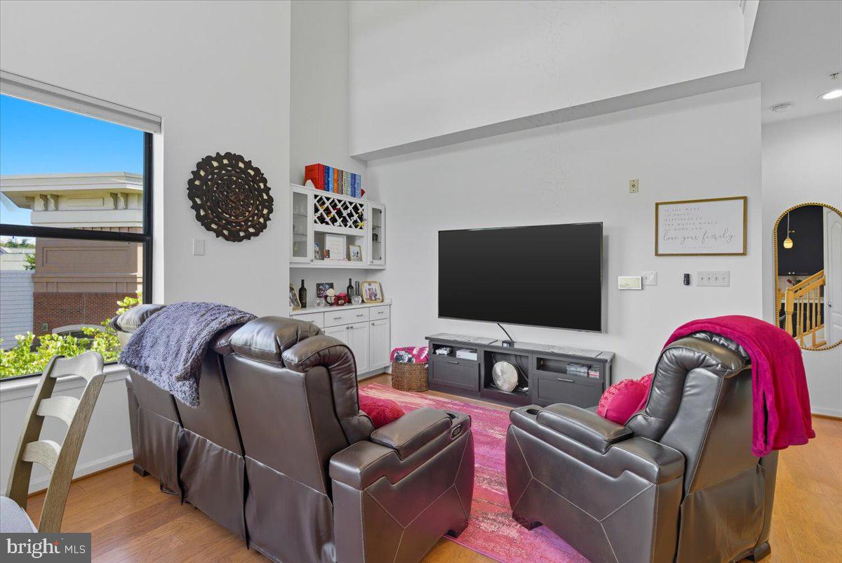 9000 Lorton Station Boulevard, Unit 2115 Lorton, VA 22079 - Photo 12 of 35 a living room with furniture and a flat screen tv