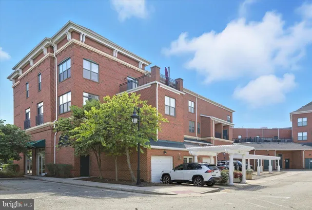 a front view of a building with street view