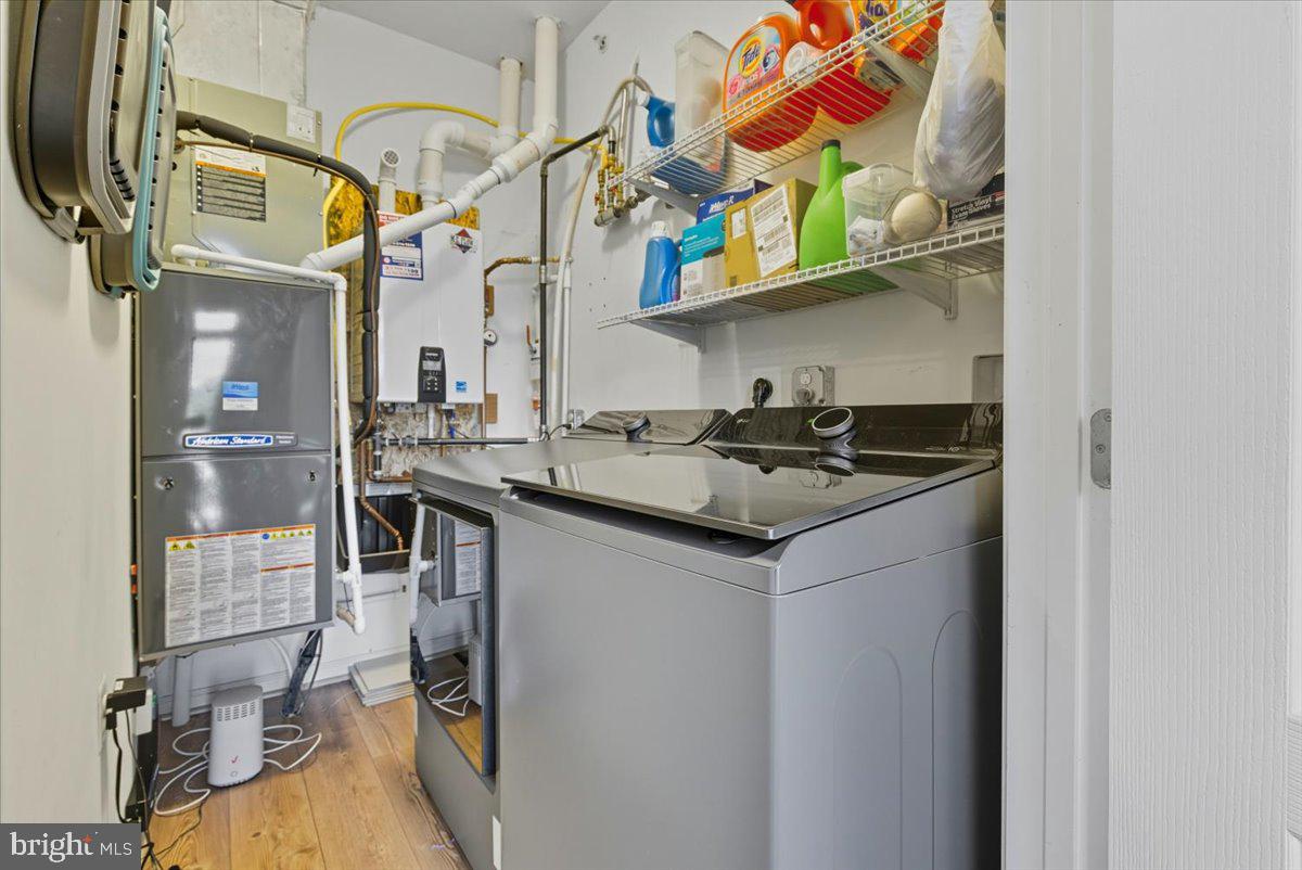 9000 Lorton Station Boulevard, Unit 2115 Lorton, VA 22079 - Photo 30 of 35 a utility room with dryer and washer