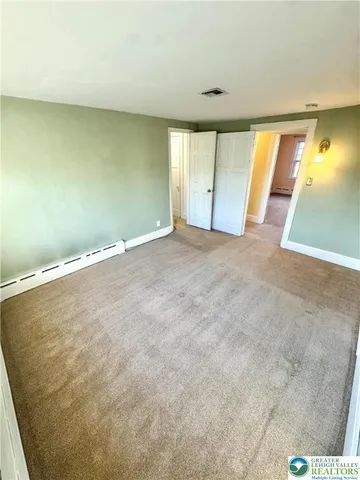 an empty room with a window