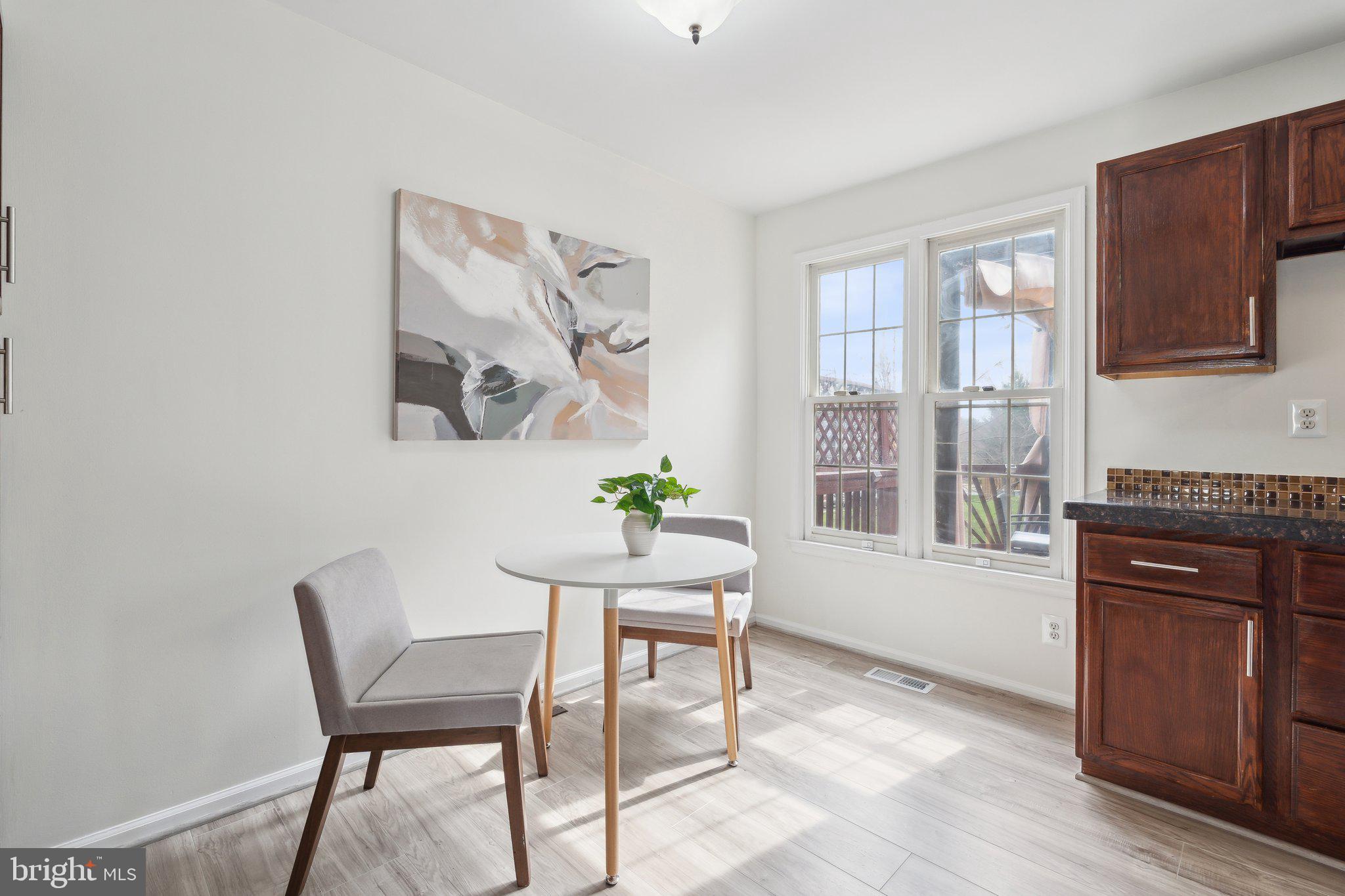 46924 Rabbitrun Terrace Sterling, VA 20164 - Photo 16 of 38 a living room with furniture and wooden floor