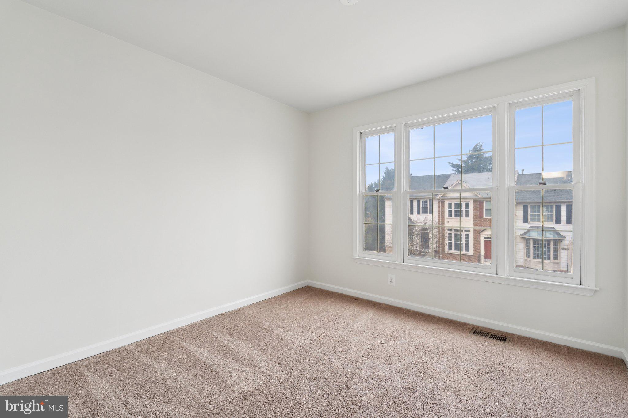 46924 Rabbitrun Terrace Sterling, VA 20164 - Photo 25 of 38 a view of an empty room with a window