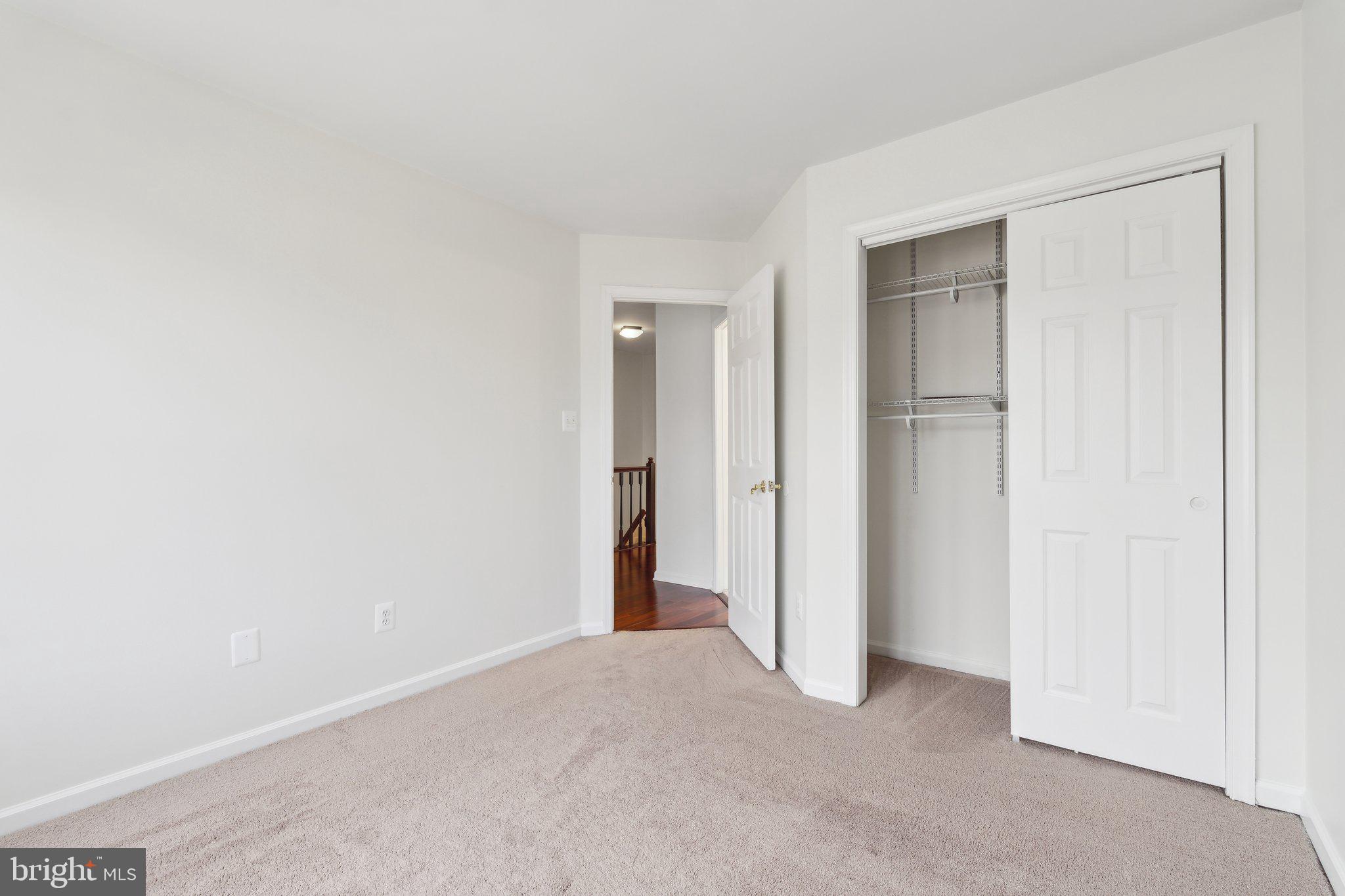 46924 Rabbitrun Terrace Sterling, VA 20164 - Photo 26 of 38 a view of an empty room and closet area