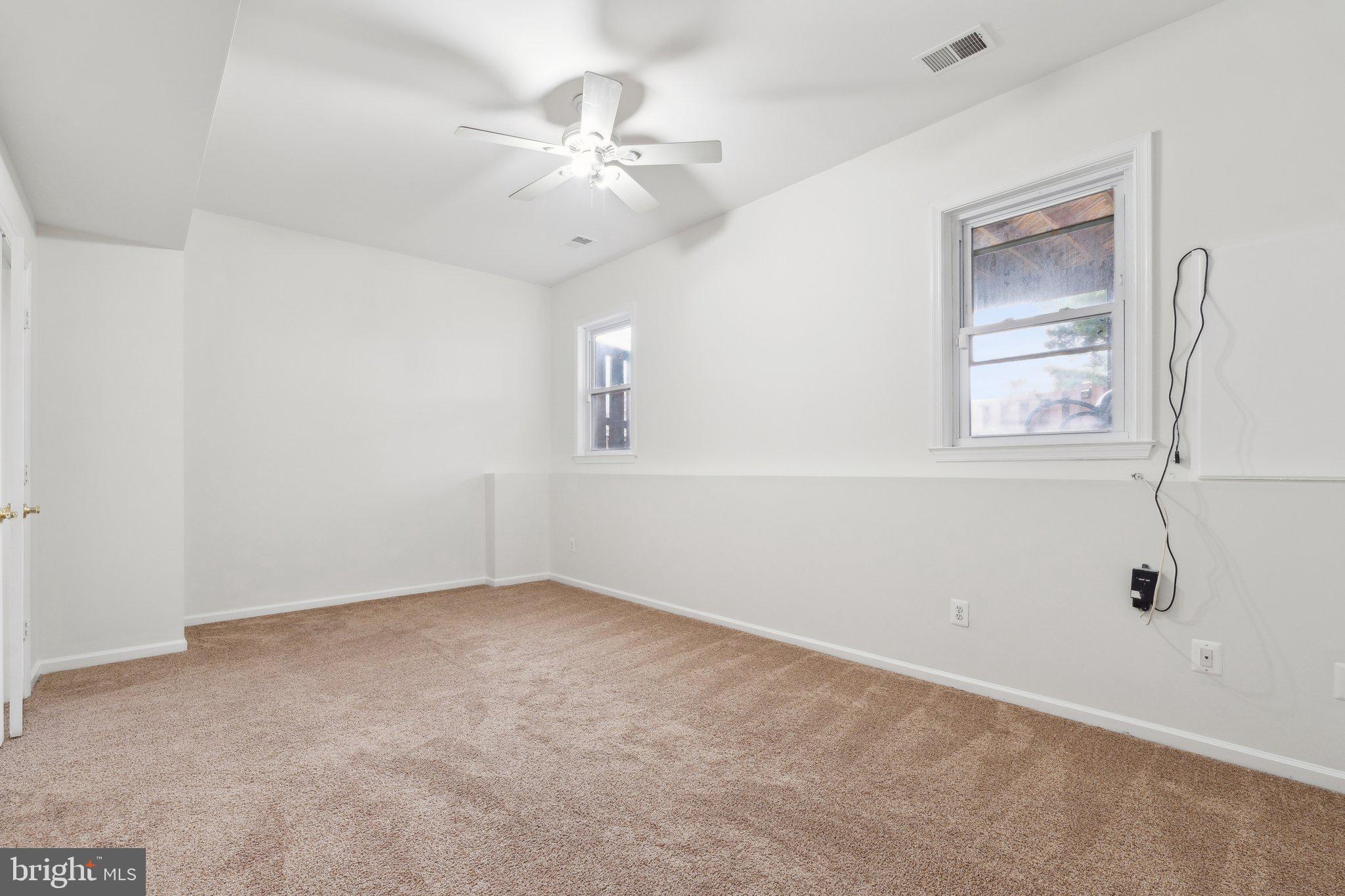 46924 Rabbitrun Terrace Sterling, VA 20164 - Photo 30 of 38 a view of an empty room with chandelier fan