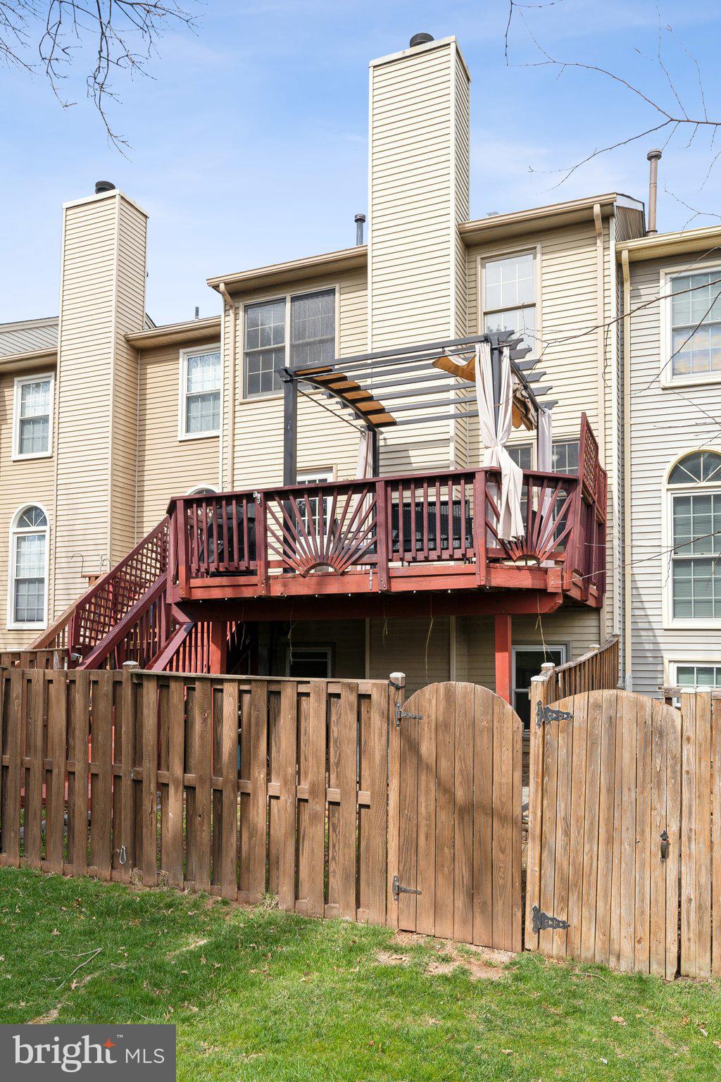 46924 Rabbitrun Terrace Sterling, VA 20164 - Photo 36 of 38 a view of a house with a yard and sitting area