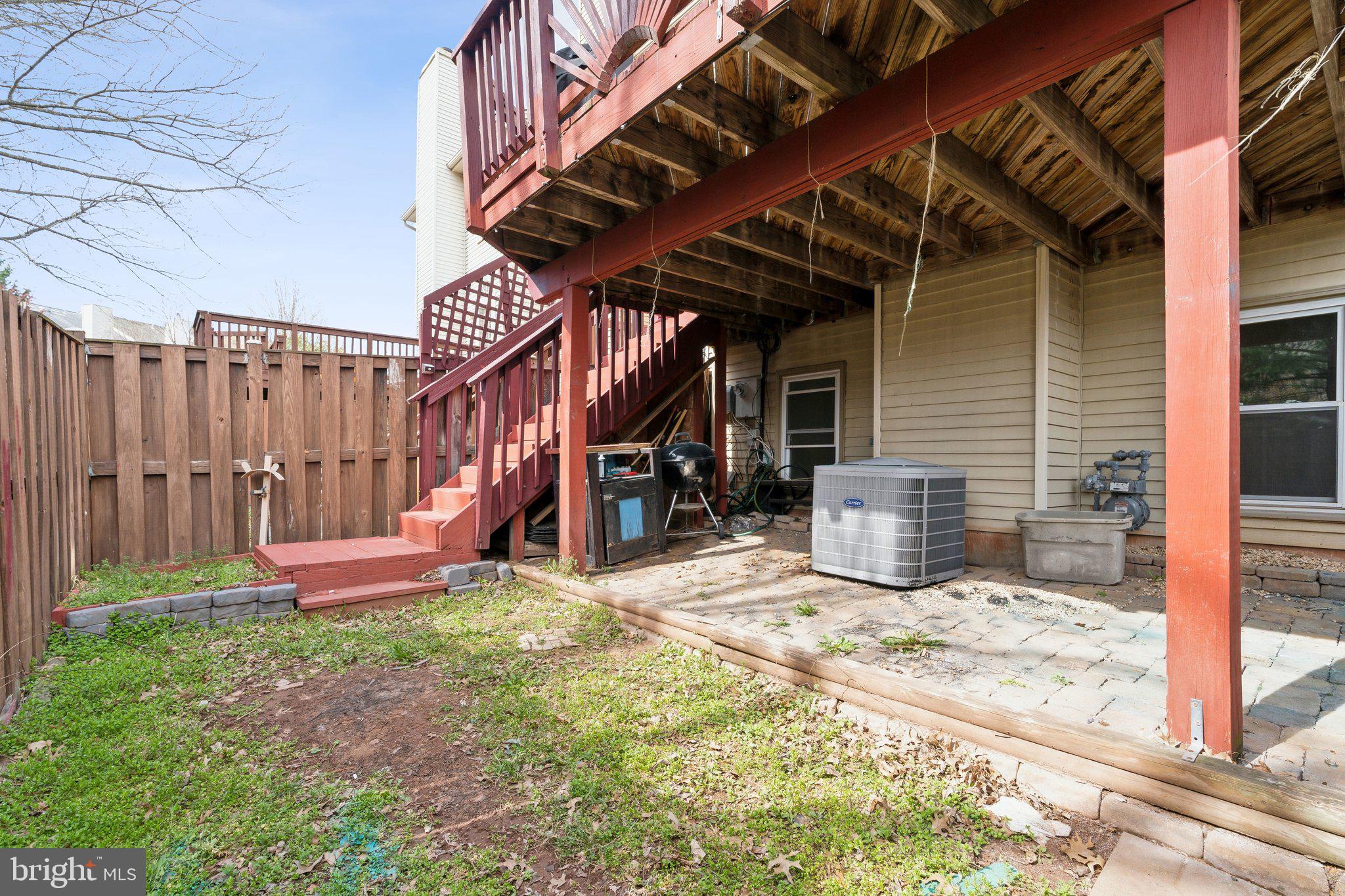 46924 Rabbitrun Terrace Sterling, VA 20164 - Photo 37 of 38 a view of a backyard with a small cabin and chair