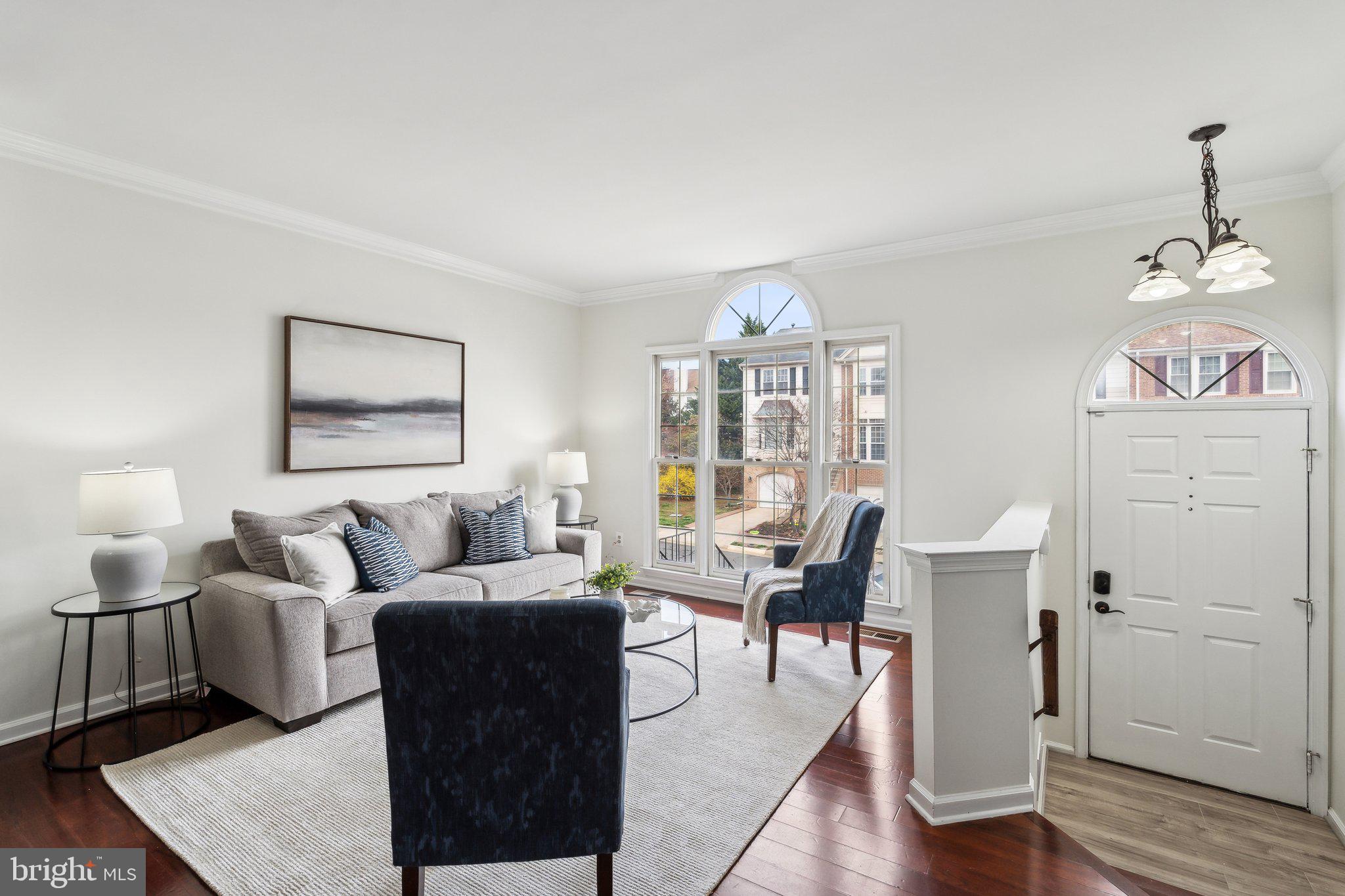 46924 Rabbitrun Terrace Sterling, VA 20164 - Photo 4 of 38 a living room with furniture wooden floor and a window