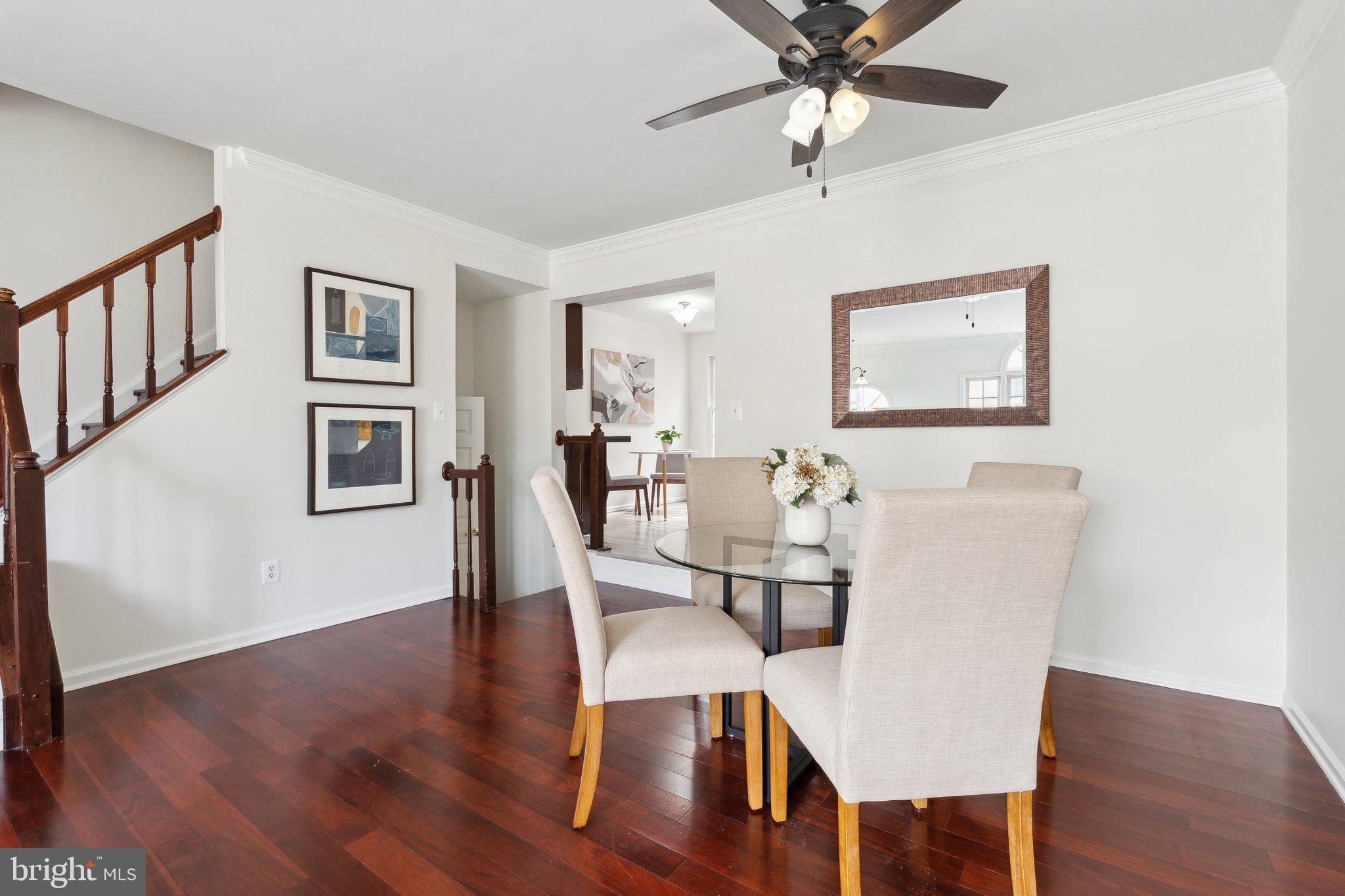 46924 Rabbitrun Terrace Sterling, VA 20164 - Photo 8 of 38 a view of a dining room with furniture and wooden floor