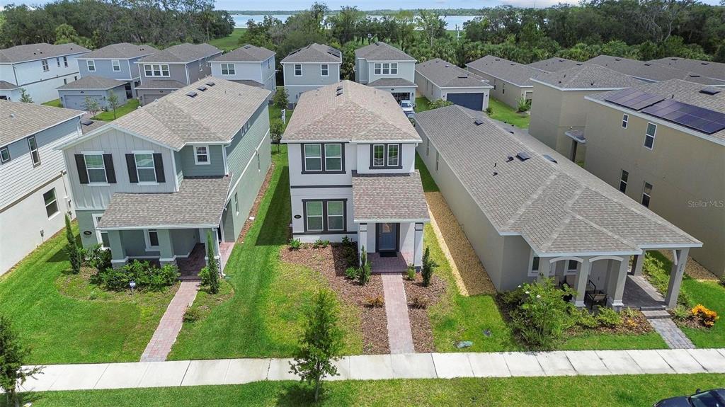 730 Rivington Drive DeBary, FL 32713 - Photo 1 of 47 an aerial view of multiple houses with a yard