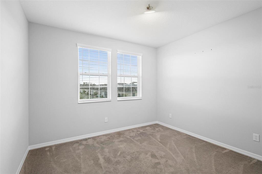 730 Rivington Drive DeBary, FL 32713 - Photo 30 of 47 an empty room with a window
