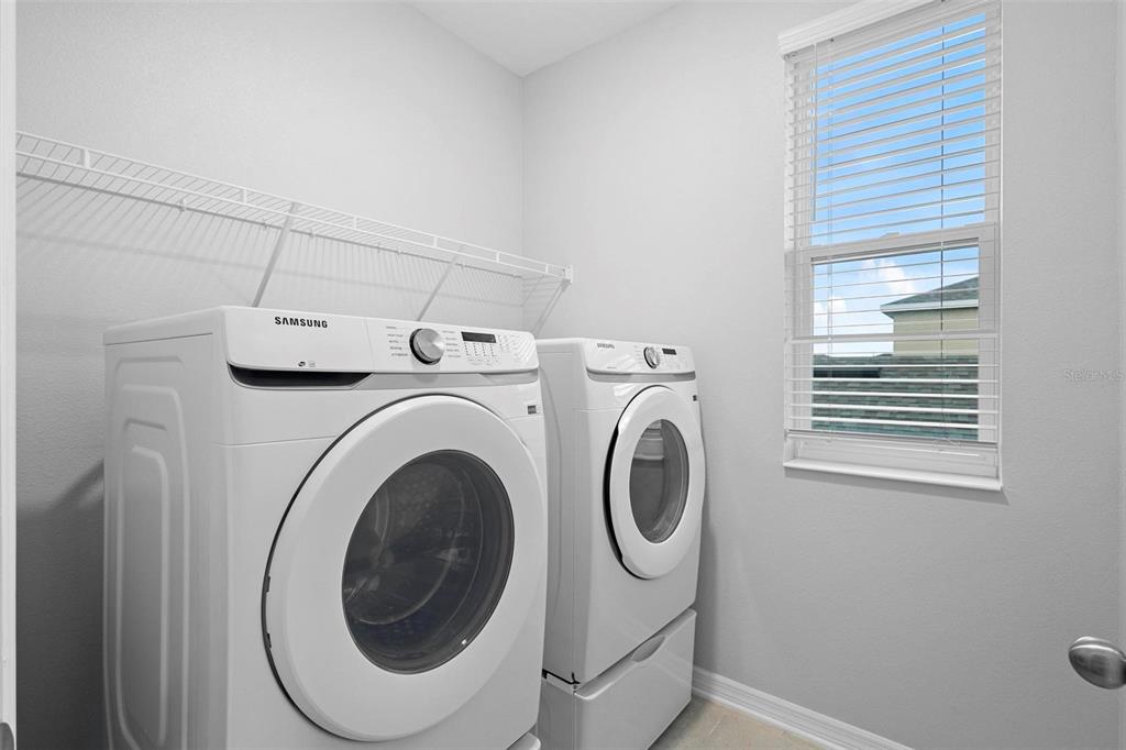 730 Rivington Drive DeBary, FL 32713 - Photo 33 of 47 a utility room with dryer and washer