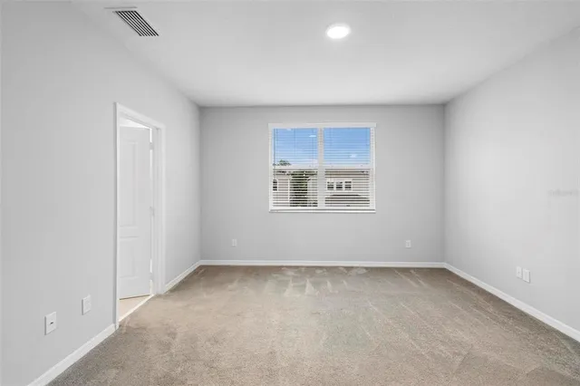 an empty room with a window