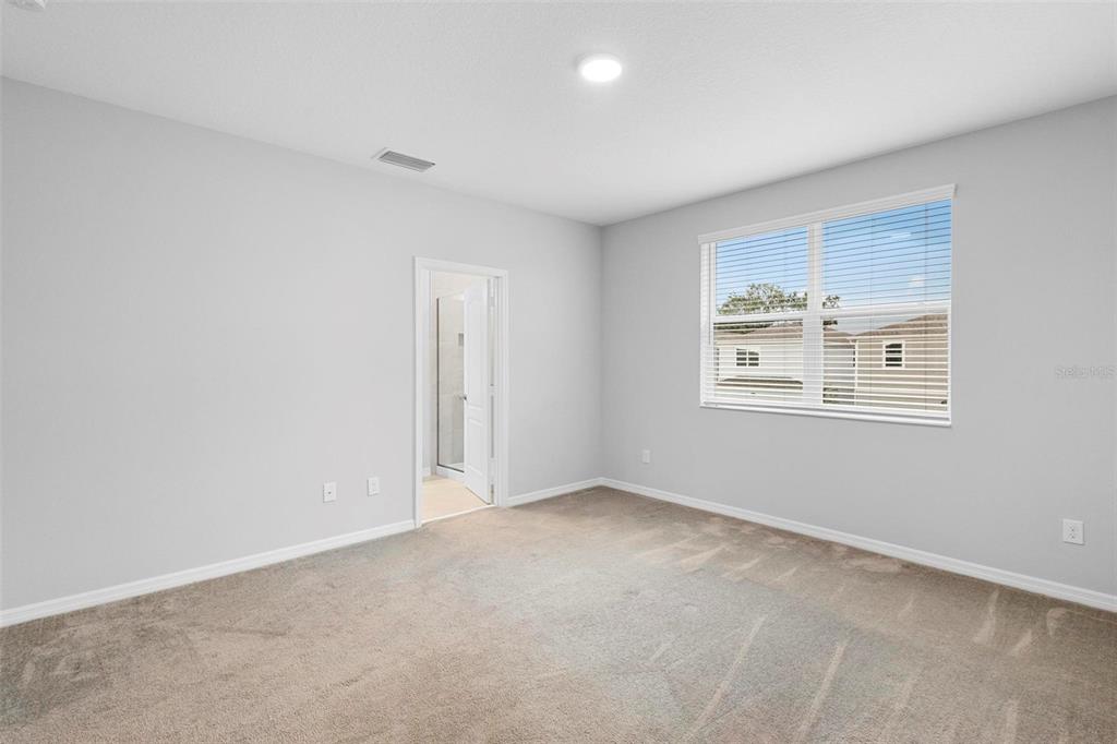 730 Rivington Drive DeBary, FL 32713 - Photo 35 of 47 a view of an empty room with a window