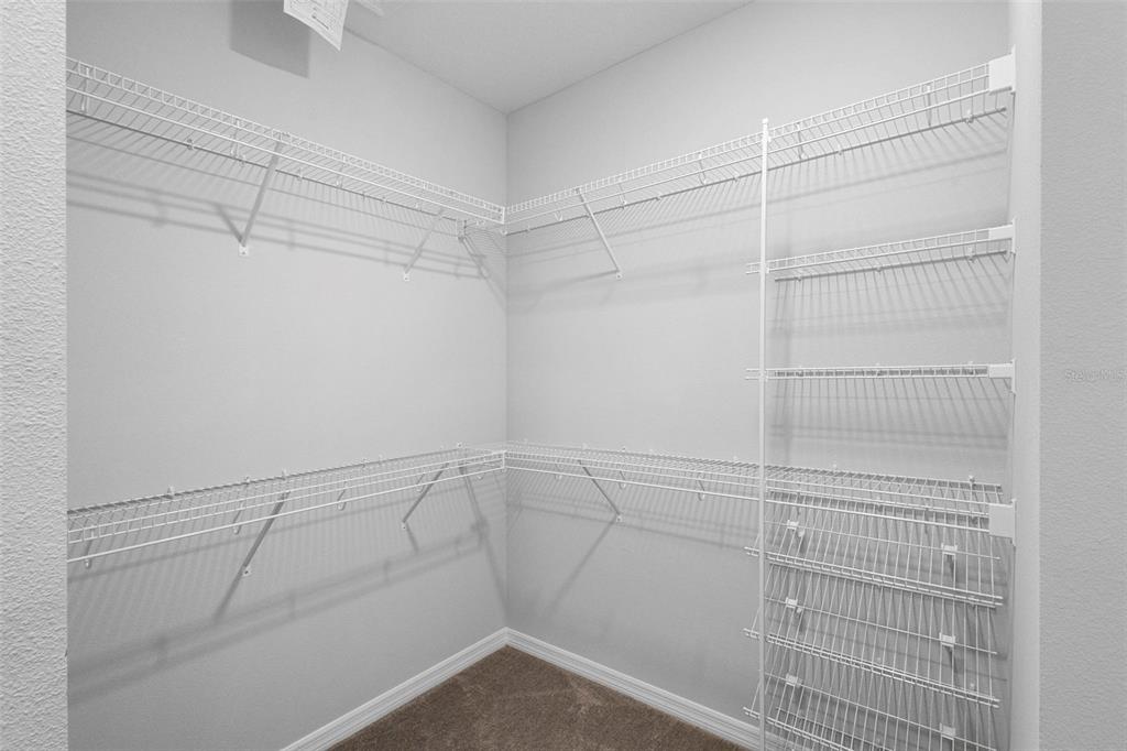 730 Rivington Drive DeBary, FL 32713 - Photo 36 of 47 a view of a room with racks on the wall