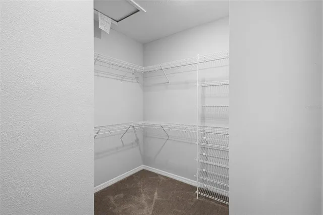 a view of an empty walk in closet