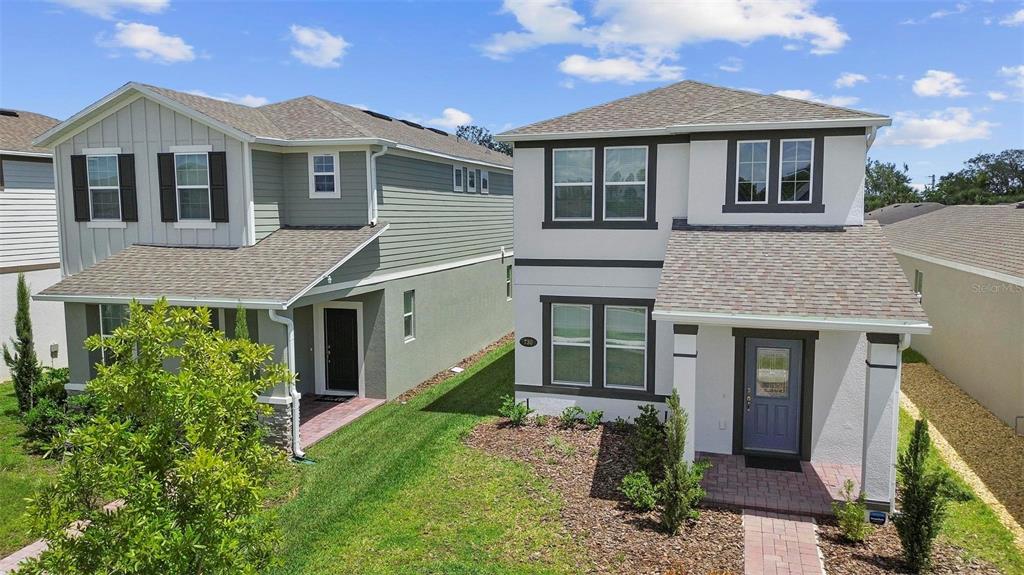 730 Rivington Drive DeBary, FL 32713 - Photo 5 of 47 a front view of a house with garden