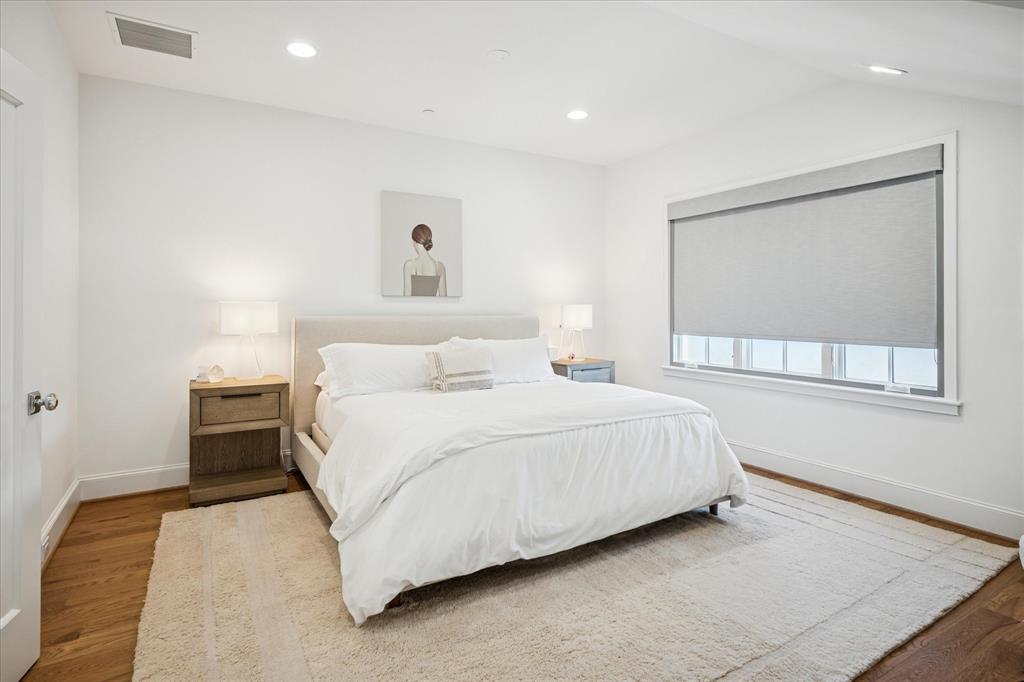 3420 Rosedale Avenue, Unit 2 University Park, TX 75205 - Photo 18 of 28 a bedroom with a bed and a window