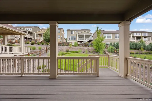 a view of balcony with furniture