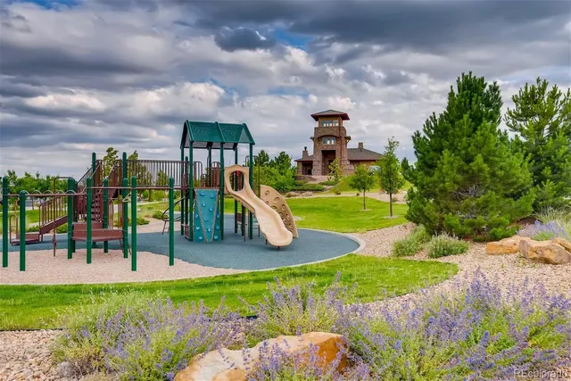 a view of a park with swings