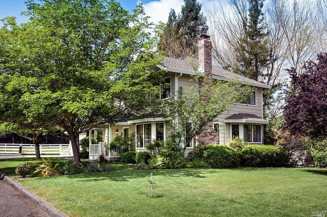 645 McClay Road Novato, CA 94947 - Photo 1 of 1 a front view of a house with a yard and trees
