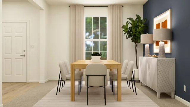 a dining room with furniture and window