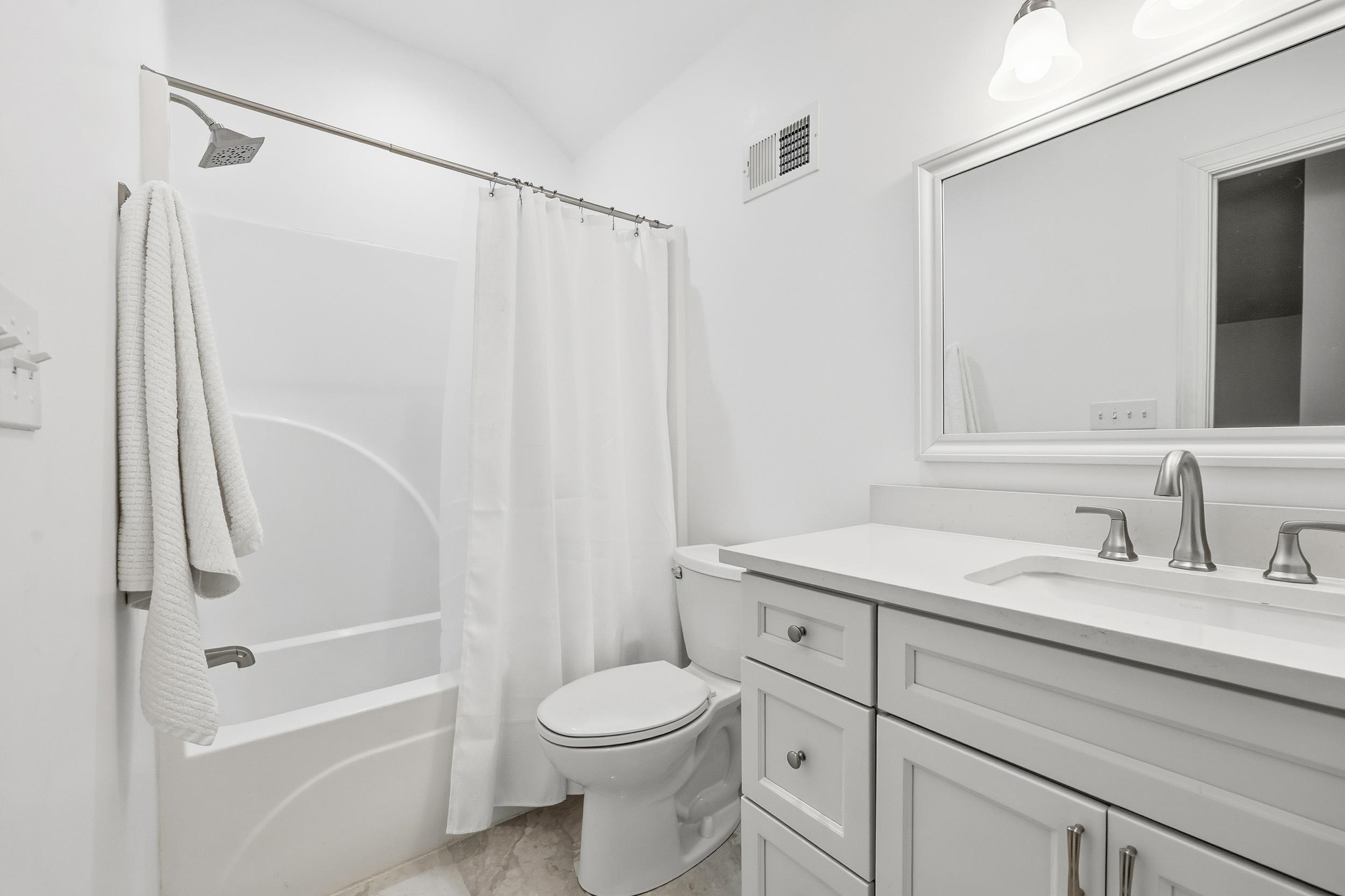 213 Old Carriage Loop Georgetown, SC 29440 - Photo 31 of 40 Full bathroom with shower / bathtub combination with curtain and vanity