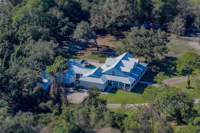 a front view of house with yard and seating area