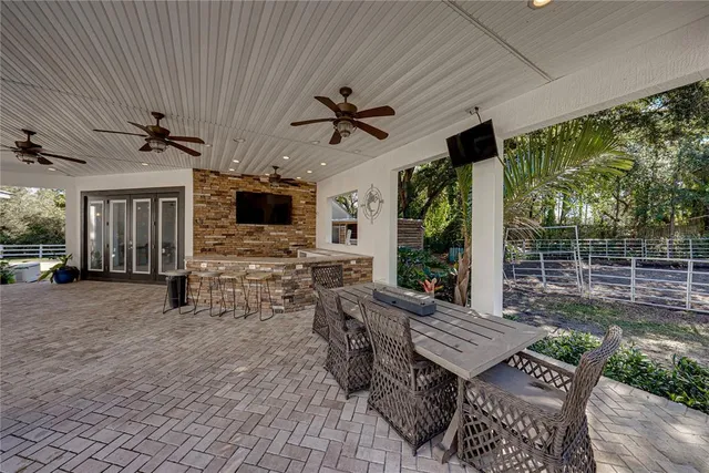a view of a livingroom with furniture and a chandelier