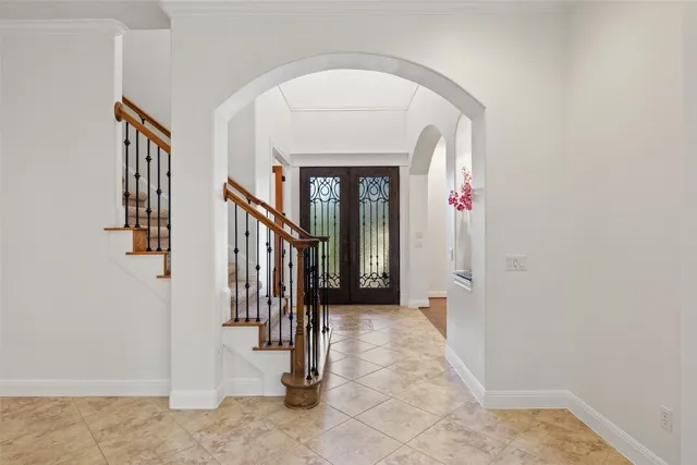 a view of a hallway with entryway