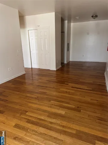 a view of room and wooden floor