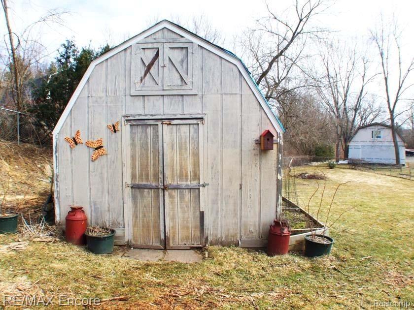 7286 Holcomb Road Clarkston, MI 48346 - Photo 16 of 20 Large shed for outdoor storage