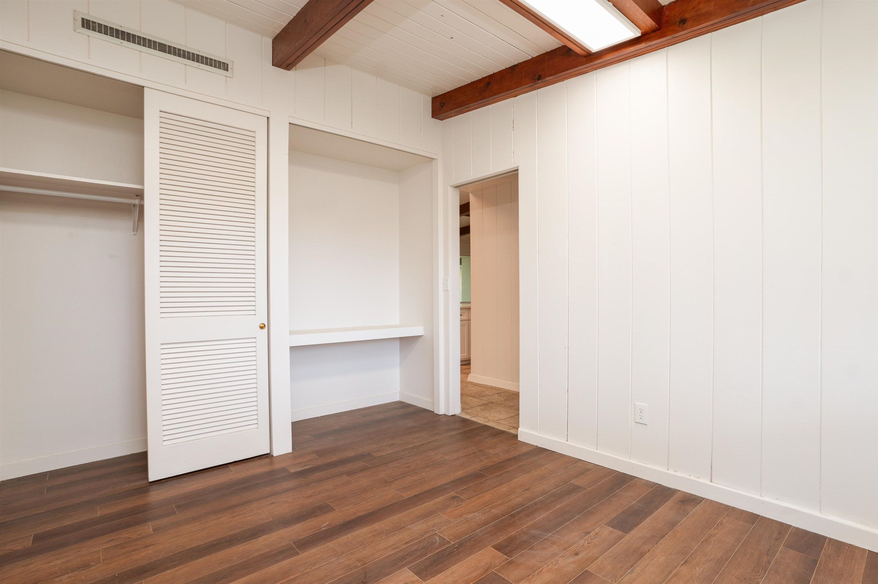 412 Wiley Parker Road Jackson, TN 38305 - Photo 22 of 28 a view of empty room with wooden floor