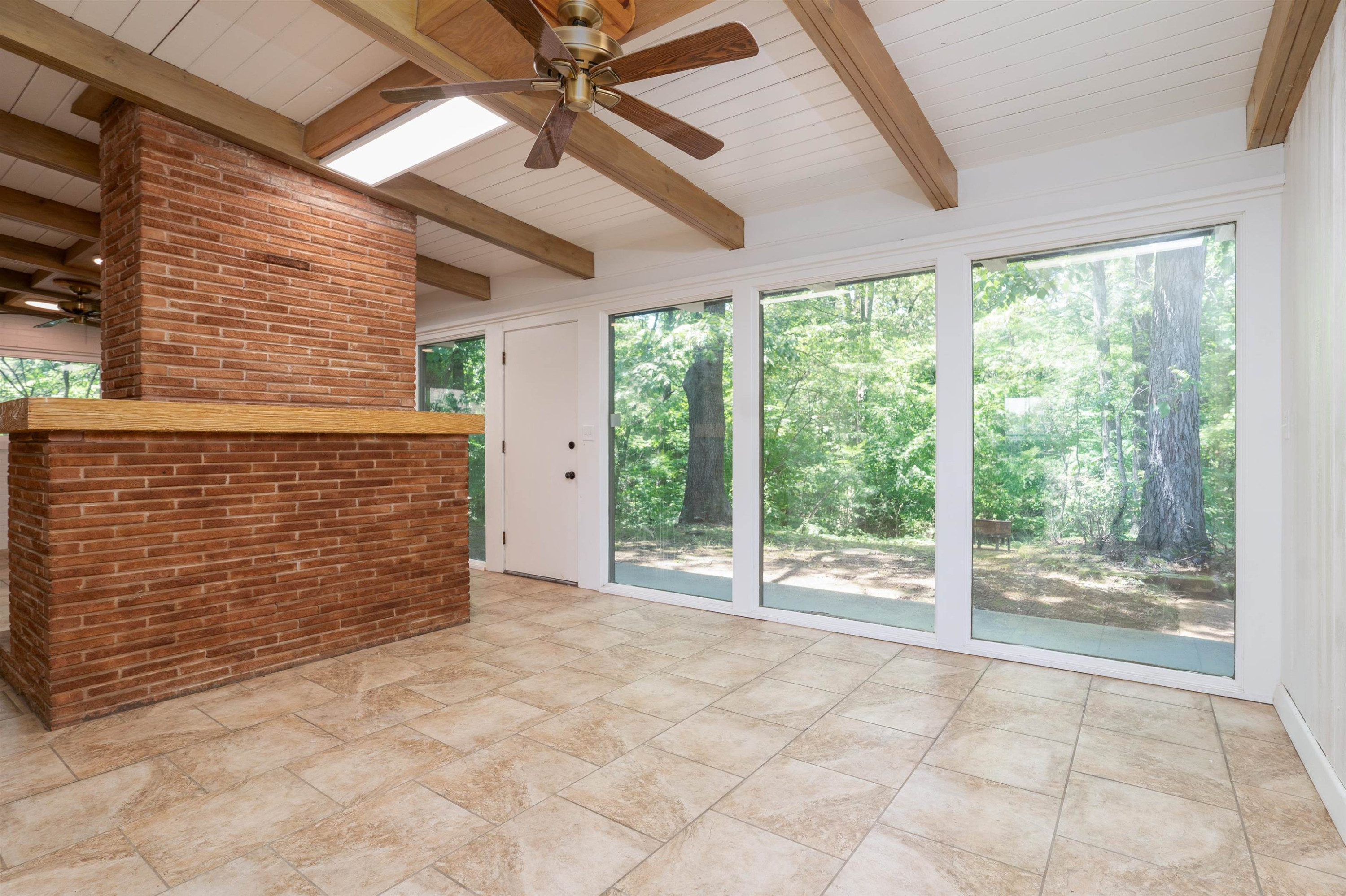 412 Wiley Parker Road Jackson, TN 38305 - Photo 4 of 28 a view of an empty room with windows