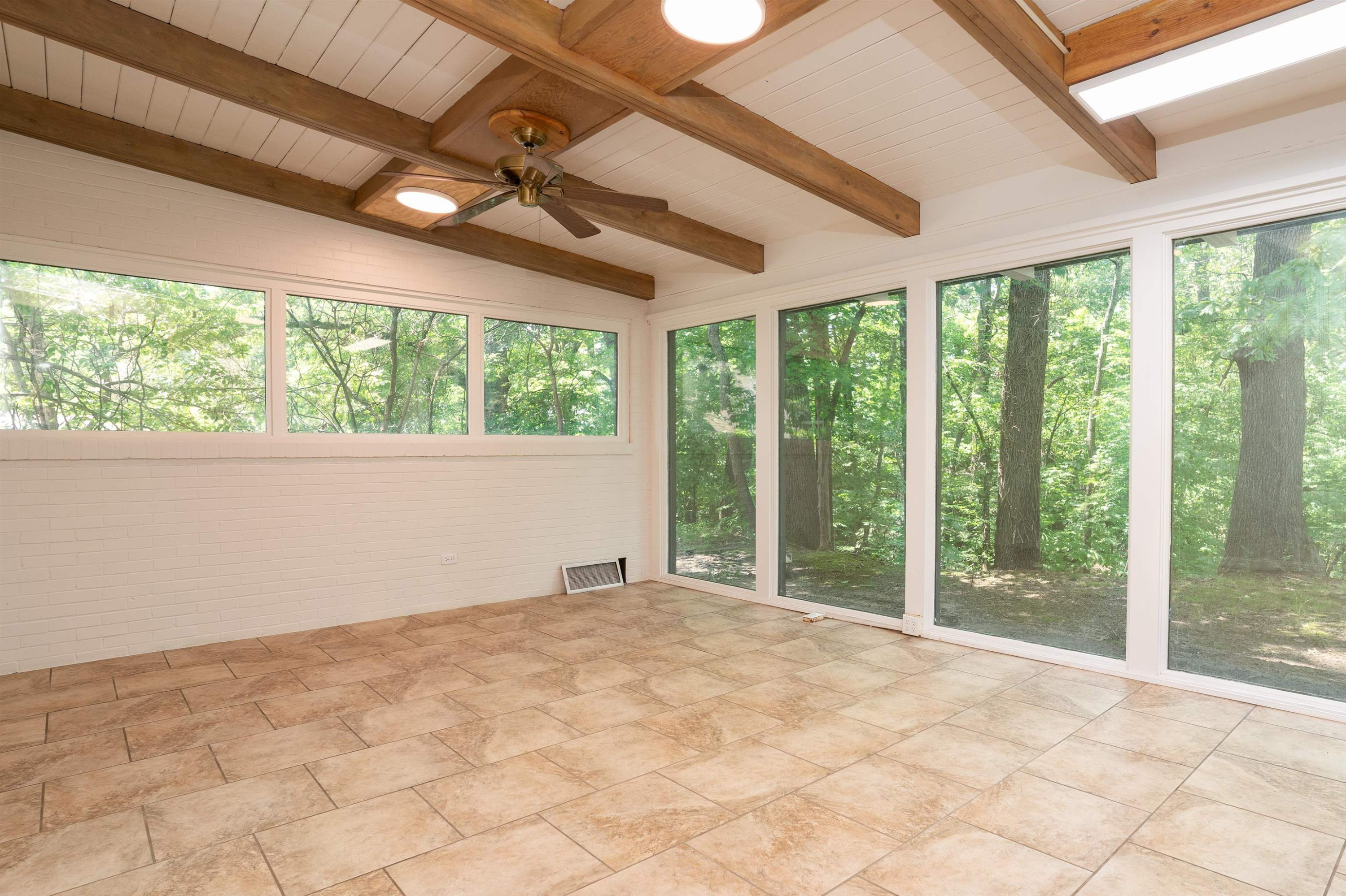 412 Wiley Parker Road Jackson, TN 38305 - Photo 8 of 28 a view of an empty room with a balcony