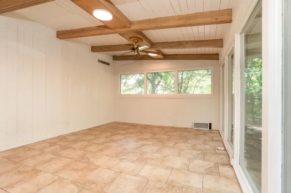 a view of an empty room and window