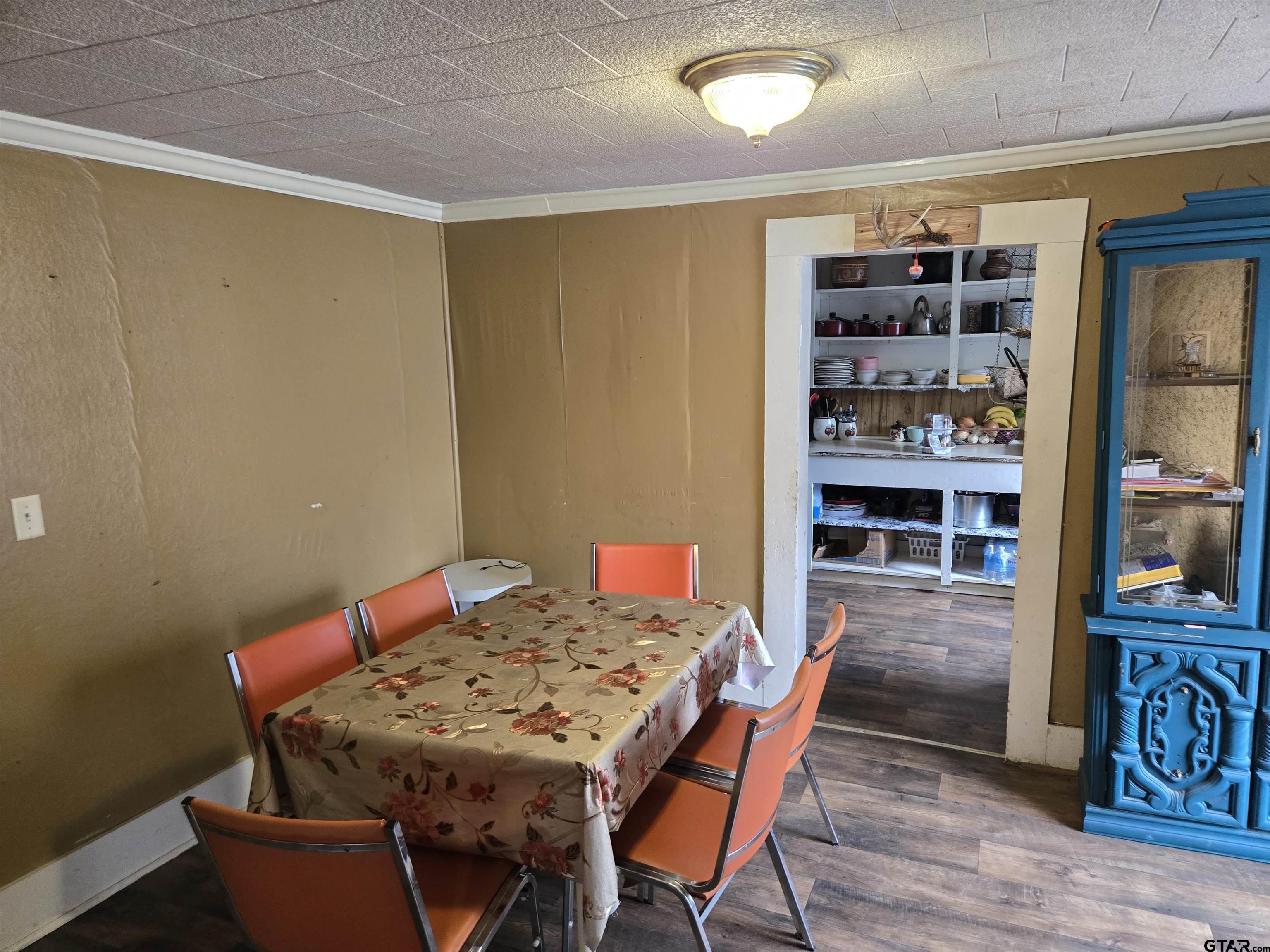 151 Joplin Rusk, TX 75785 - Photo 10 of 17 a view of a dining room with furniture and wooden floor
