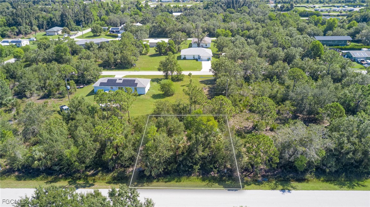11356 4th Avenue Punta Gorda, FL 33955 - Photo 3 of 9 a view of a lake with large trees