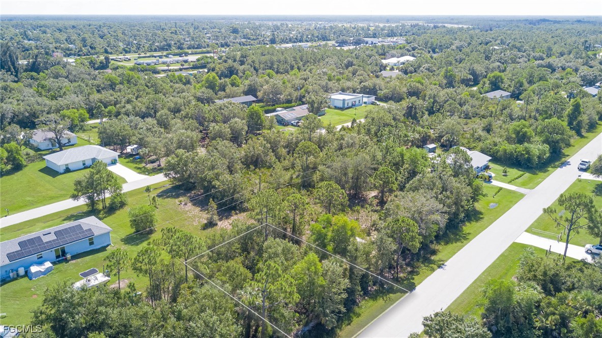 11356 4th Avenue Punta Gorda, FL 33955 - Photo 8 of 9 an aerial view of residential houses with outdoor space and trees